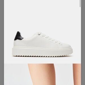 Black and white Steve Maddens